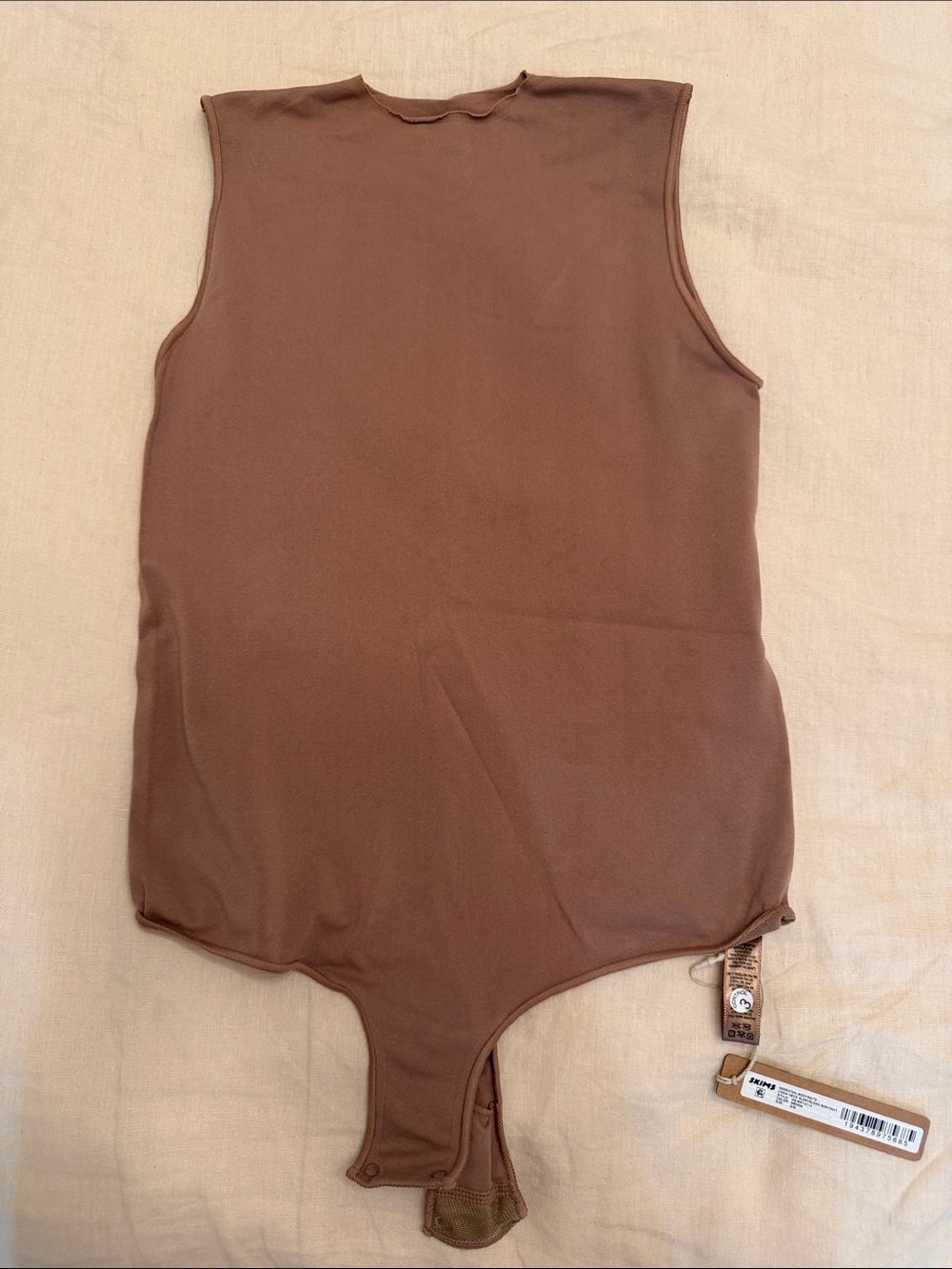 SKIMS Strapless Bodysuit in Sienna